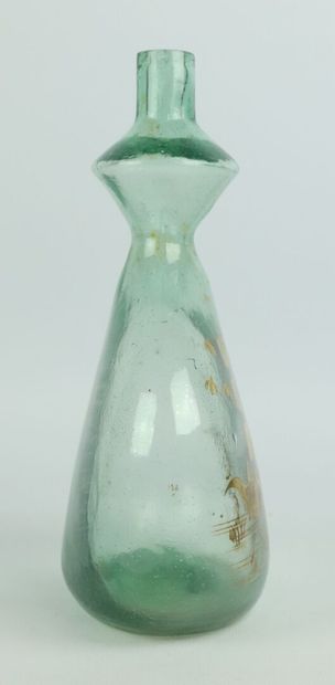null Bottle with double body out of green glass, with gold decoration of a three...