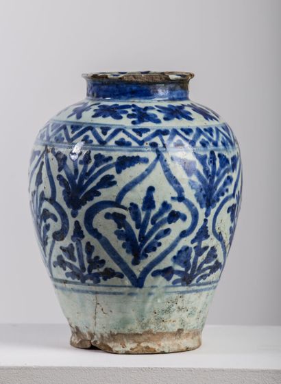 null PERSIA.

Set of three ceramics with blue decoration including a vase, a bowl...