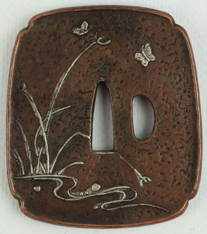 null JAPAN.

Tsuba decorated with a wading bird, rushes and butterflies.

Signed.

H_7,9...
