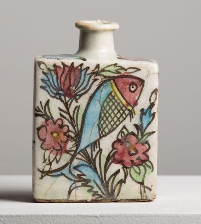 null PERSIA.

Ceramic tile and bottle with polychrome decoration of bird and fish.

Qadjar...
