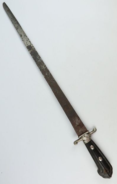 null Large dagger, the spindle in carved ebony, the guard in punched silver.

The...