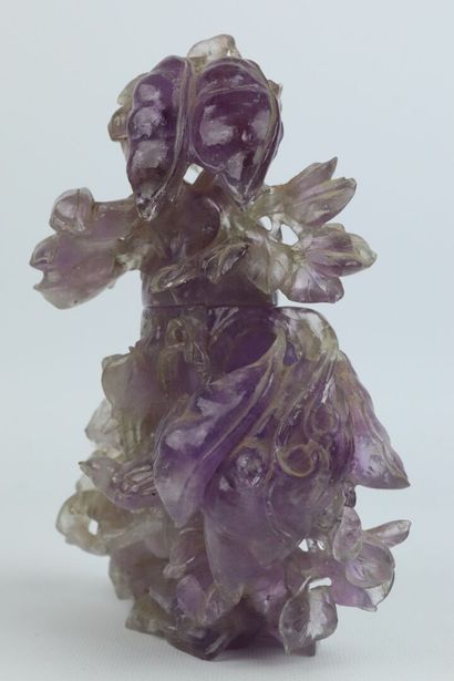 null CHINA.

Covered vase in amethyst carved with leaves, fruits and bird.

H_20...