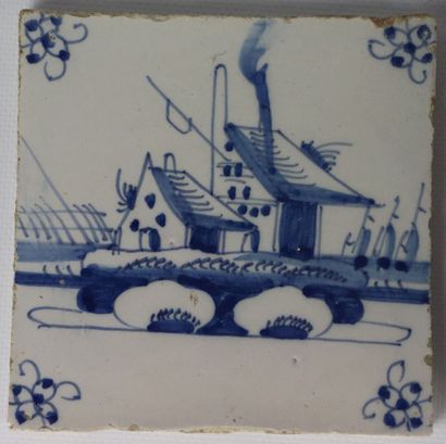 null DELFT.

Cinq carreaux en faïence à décor en camaïeu bleu de maisons et bateau

XVIIIème...