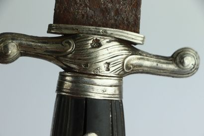 null Large dagger, the spindle in carved ebony, the guard in punched silver.

The...