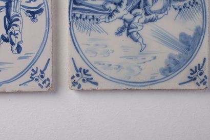 null DELFT.

Four earthenware tiles decorated in blue monochrome of animated scenes.

XVIIIth...