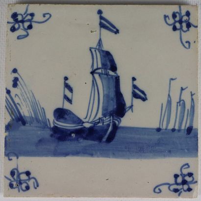 null DELFT.

Five earthenware tiles with blue monochrome decoration of houses and...