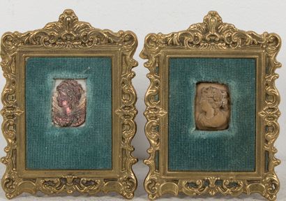 null Two medallions representing busts of women in the antique style, one in mother-of-pearl,...