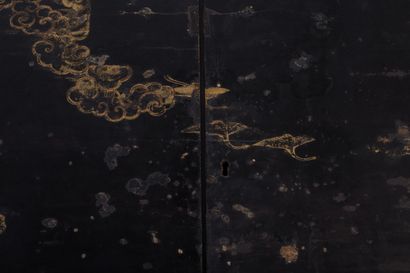 null JAPAN.

Pair of panels, formerly mounted in doors, in black lacquered wood,...