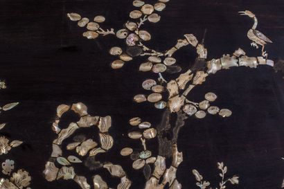 null CHINA.

Exotic wood panel inlaid with mother-of-pearl, decorated with prunus...