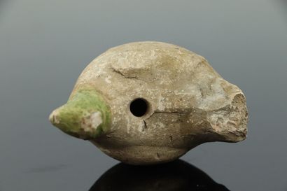 null SAINTONGE.

Whistle in the shape of a bird partially enamelled green.

17th...