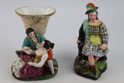 null PARIS.

Two groups in polychrome and gold porcelain, one decorated with a scottish,...