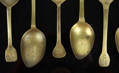 null Set of six brass porridge spoons, the handles punched.

Normandy, early 19th...