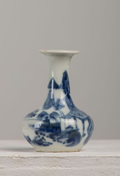 null CHINA or VIETNAM.

Porcelain vase with blue underglaze decoration of animated...