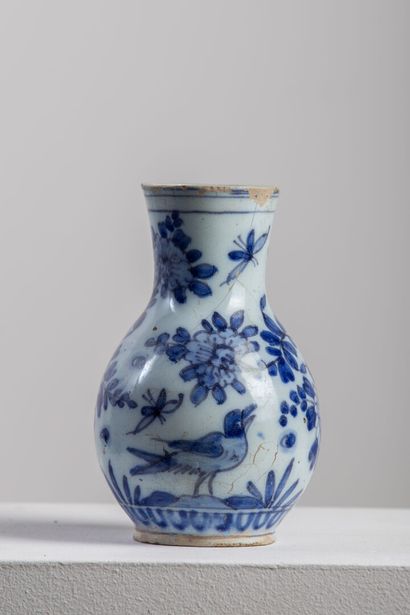 null FRANKFURT (?).

Earthenware vase decorated with flowering branches, bird and...