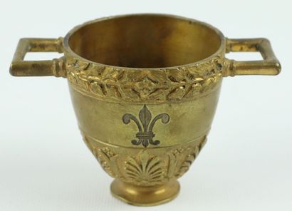 null Set of bronze and brass objects including :

a vase with handles in the Greek,...
