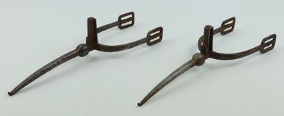 null Pair of iron spurs.

19th century.

L_28 cm