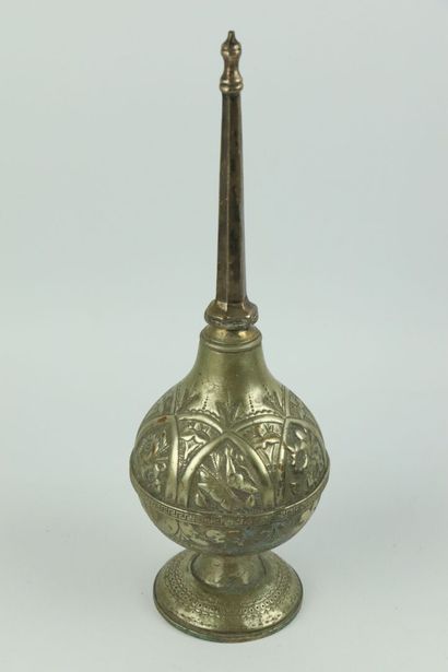 null NEAR EAST and NORTH AFRICA.

Set of brassware including :

two iron vases with...