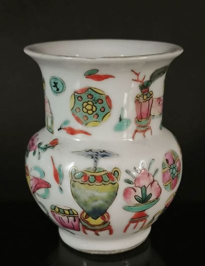 null CHINA.

Porcelain vase of baluster form decorated with Chinese furniture.

Mark...