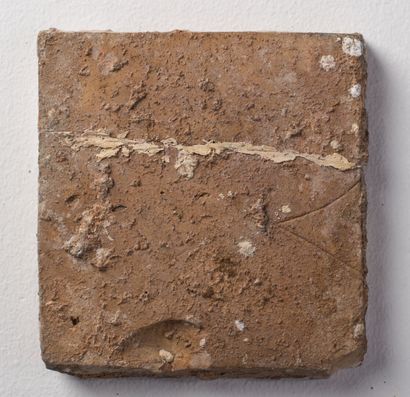 null Pavement tile in majolica.

16th century.

L_13 cm l_14 cm, fragmentary