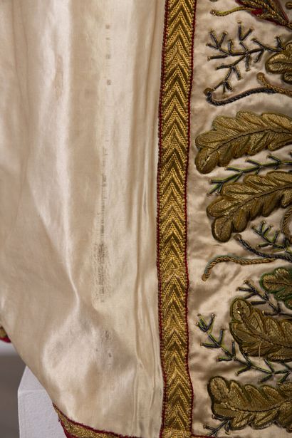 null Mantle with rich embroidered decoration of flowering branches.

Missing the...