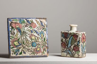 null PERSIA.

Ceramic tile and bottle with polychrome decoration of bird and fish.

Qadjar...