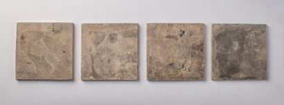 null DELFT.

Four earthenware tiles decorated in blue monochrome of animated scenes.

XVIIIth...