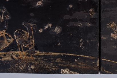 null JAPAN.

Pair of panels, formerly mounted in doors, in black lacquered wood,...