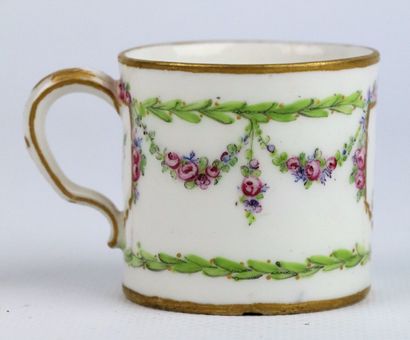 null SEVRES.

Porcelain cup and saucer, decorated with garlands of flowers and the...