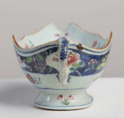 null CHINA.

Porcelain sauceboat with polychrome decoration of court scene.

18th...
