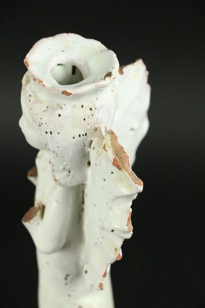 null Candlestick in white glazed earthenware, featuring an angel.

H_29,3 cm, ac...