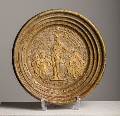 null Glazed earthenware dish, decorated with pastillage of a knight flanked by two...