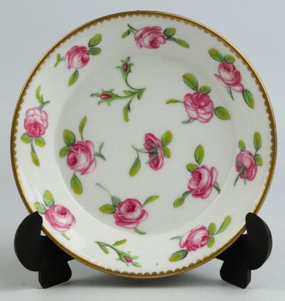 null SEVRES.

A porcelain cup and saucer, decorated with a semis of roses.

XVIIIth...