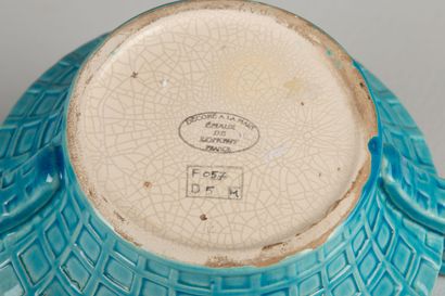 null 
LONGWY. In the taste of . 




Basket in earthenware and polychrome enamels...