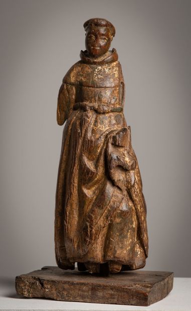 null Statuette en bois sculpté figurant un moine, le visage arrondi.

Espagne, XVIIème...