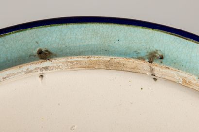 null LONGWY.

Circular dish in earthenware and polychrome cloisonné enamels decorated...