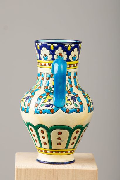 null LONGWY.

Vase with two handles out of earthenware and polychrome enamels in...