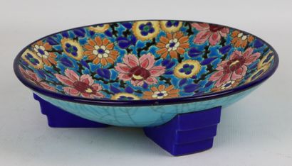 null LONGWY.

Tripod enamelled earthenware bowl with polychrome decoration of flowers.

H_5,5...