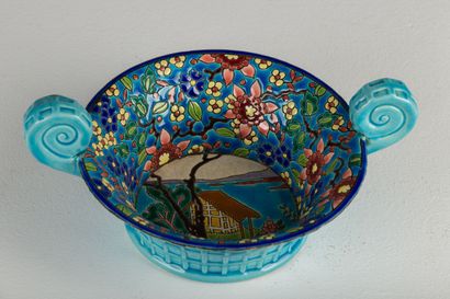 null 
LONGWY. In the taste of . 




Basket in earthenware and polychrome enamels...