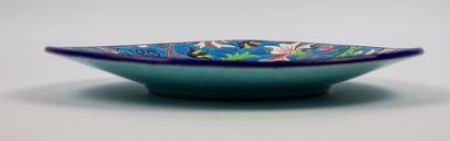 null LONGWY.

Three-lobed earthenware cup with polychrome enamel decoration, with...