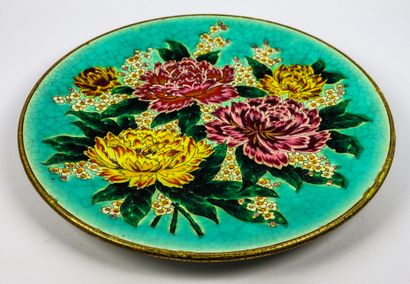 null LONGWY, decoration of M.P. CHEVALLIER.

Dish "Peonies" in earthenware with polychrome...
