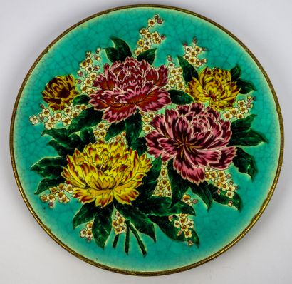 null LONGWY, decoration of M.P. CHEVALLIER.

Dish "Peonies" in earthenware with polychrome...