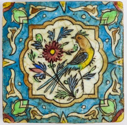 null PERSE.

Carreau en céramique à décor d'un oiseau branché.

Epoque Qadjar.

L_20,2...