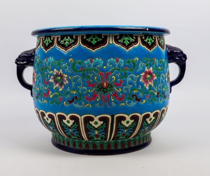 null LONGWY.

Earthenware pot-holder with decoration in polychrome enamels of flowery...