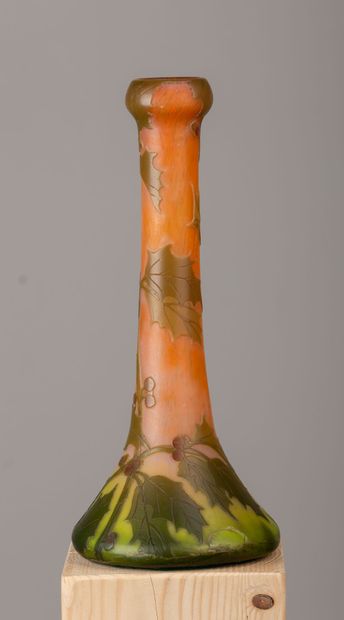 null LEGRAS.

Vase with long neck in pod out of multi-layered acid-etched glass with...