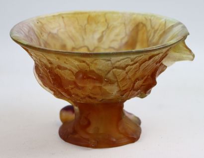 null DAUM France, 

Cup on foot out of glass paste of color ambrée with decoration...