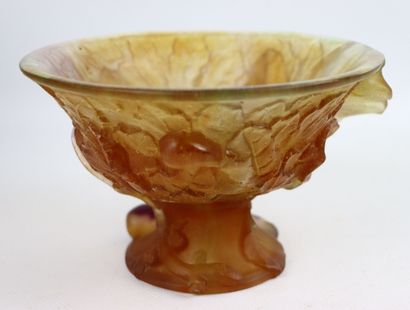 null DAUM France, 

Cup on foot out of glass paste of color ambrée with decoration...