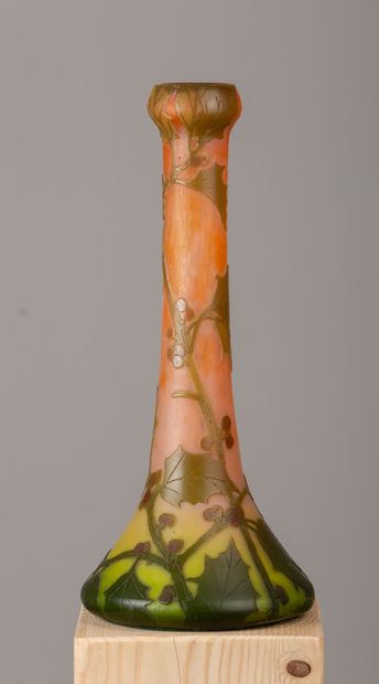 null LEGRAS.

Vase with long neck in pod out of multi-layered acid-etched glass with...