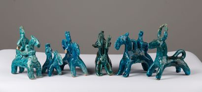 null IRAN or AFGHANISTAN.

Set of six turquoise-glazed ceramic horses and riders...