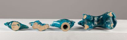 null IRAN or AFGHANISTAN.

Set of eight turquoise-glazed ceramic animals with incised...