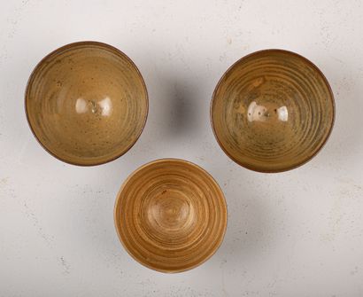 null Pair of stoneware bowls on small heel, monogrammed on the back.

A Japanese...